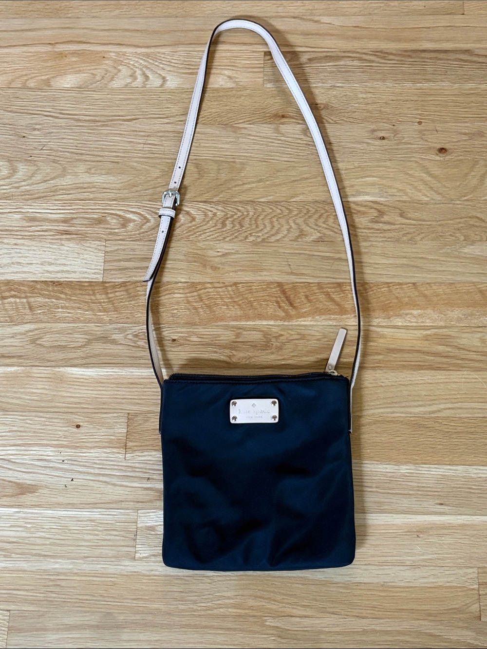 kate spade black crossbody with tan leather strap